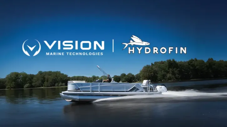 Vision Marine Technologies and Hydrofin logos on a photo of a pontoon moving across a lake under clear blue skies