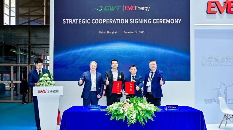 Representatives of EVE Energy and Green Whale Technology give the thumbs up at a signing ceremony for a new partnership to accelerate marine battery deployment